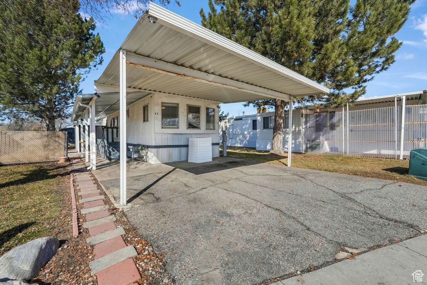 PRICE IMPROVEMENT! This cozy house is situated in Riverdale, an all-age mobile home neighborhood with easy access to shops, schools, the interstate, and stunning mountain vistas. Features of this home include a newer roof and updated kitchen, gas range, granite counter tops. Come check out what this home has to offer you.  Square footage figures are provided as a courtesy estimate only. Buyer is advised to obtain an independent measurement.