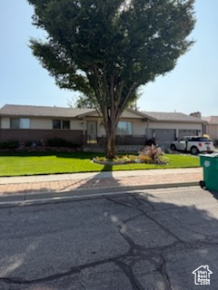 Newly available in Woods Cross, a quiet, family-friendly suburb with a welcoming, close-knit community and a slower pace. But also provides easy access to all the city conveniences; 10 miles to downtown Salt Lake, 13 miles to the airport, or stay home and enjoy updating this cute ranch style home with your own upgrades. Get this home before a flipper gets their hands on it. 3 bedrooms, 2 bathrooms, a drive through garage to a wonderfully landscaped mature back yard. Blank slate waiting for you to jump in. Photos coming oct 9.