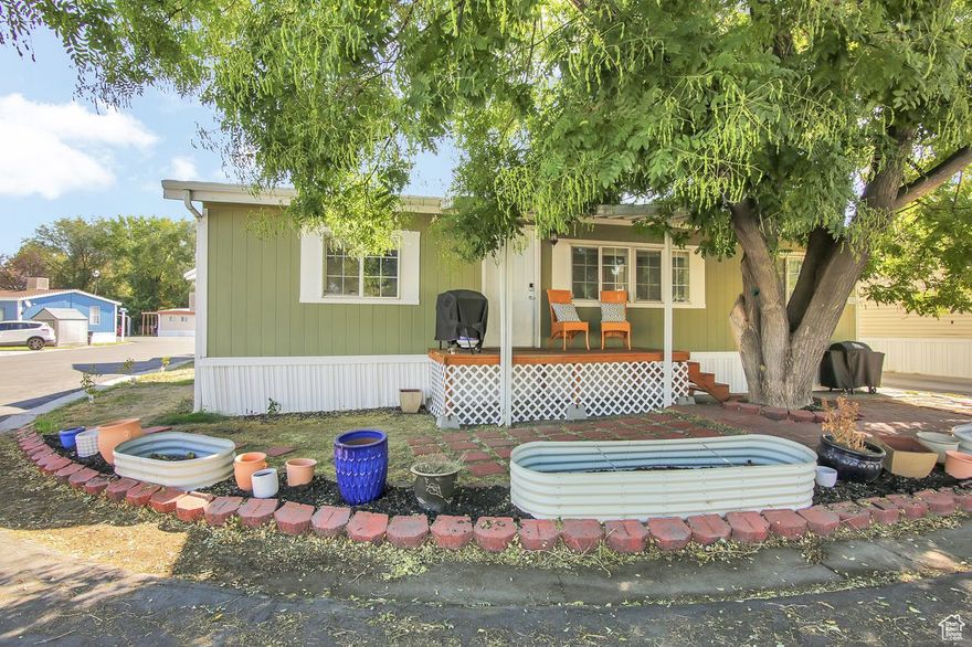 WOW! This charming double-wide mobile home is located on a corner lot. The dishwasher and garbage disposal are new plus both bathrooms are updated. Three bedrooms and two bathrooms.  The kitchen is spacious with a gas stove, white cabinets, a large laundry room, and laminate flooring throughout the home. This home is located close to the playground, pool, and minutes away from schools, parks, Valley Fair Mall, freeways, Mountain View Corridor, and Bangerter HighwayLot Fee includes:  Gas, snow removal, clubhouse, playground, and pool. Square footage provided from building records, as a courtesy only.  Buyer and Buyer's Agent to verify all information.
