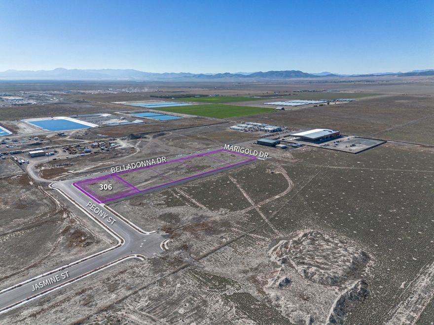 Prime .84-acre industrial lot in the Sweetwater Industrial Area of Eagle Mountain. Flat, build-ready site with power, sewer, water, and gas stubbed-ideal for immediate construction. Includes curb, gutter, and sidewalks, offering excellent access and visibility.  Perfect for light industrial, flex, or contractor use in one of Utah County's fastest-growing industrial corridors. Surrounded by active development and infrastructure expansion such as Meta and Google, this lot offers exceptional value and long-term potential.  Additional parcels available from 1.87 to 206 acres - inquire for Offering Memorandum.