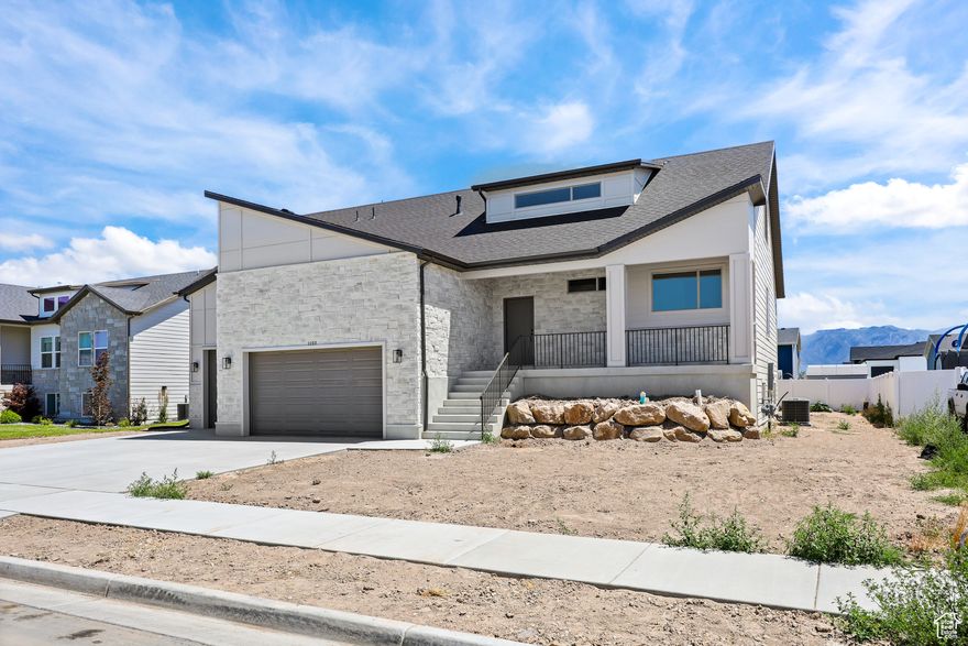 READY NOW!!! Discover this beautifully upgraded custom home featuring a main-level master suite and a spacious open-concept design perfect for entertaining.Close proximity to the new elementary and Jr high. Step outside to your covered Trex deck - perfect for year-round enjoyment . The home is loaded with premium upgrades throughout, combining style and functionality in every detail. Located just minutes from the new freeway access, this home offers both convenience and luxury.  A rare find with thoughtful design, exceptional craftsmanship, and a layout that truly works for today's lifestyle. Come and see...