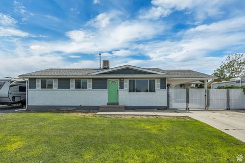 Photo of 7427 W CENTENNIAL Ave S, Magna, UT 84044 (MLS # 2105587)