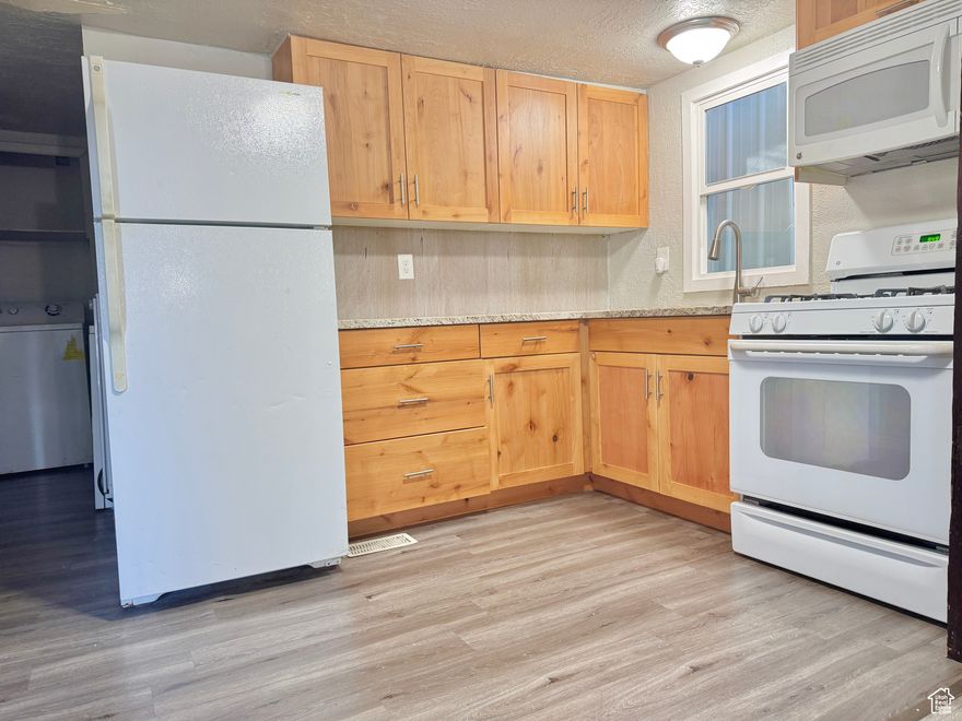 PRICE REDUCED! Come check out this 3 bed 2 bath Lehi mobile home and make it your own. It is located right on state street and right off i15 making any commute a breeze. The furnace was installed 3 years ago, and there is a washer and dryer in the unit included! Square footage is provided as a courtesy estimate only; buyer is recommended to take their own measurement.