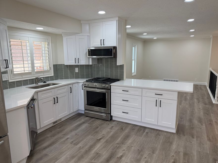 DROP DEAD GORGEOUS!!  Come see your future home before it is gone.  This home is in a prime location conveniently located next to shopping, entertainment, restaurants, and the old Cottonwood Mall location where so many new restaurants and stores are opening.  This home has been beautifully remodeled from top to bottom with a new dream kitchen that is ready to host your friends and family for get togethers, stainless steel appliances, an on suite that is to die for, generous sized bedrooms, open space layout to enjoy family and friends on movie night, and even a community pool to get cool on those hot summer days.  Homes like this don't hit the market every day and won't last long as this home is definitely a pleaser.    Square footage figures are provided as a courtesy estimate only and were obtained from the county assessor.  Buyer is advised to obtain an independent measurement.  Per the sellers request, no showings till Saturday, May 16th at the open house at 12 - 2:00pm.