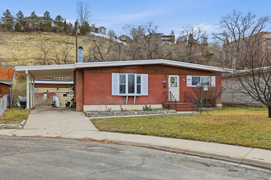 Located in the heart of North Pocatello, this 3-bed, 2-bath home blends classic charm with a practical layout designed for easy living. The interior shines with key updates, including fresh paint (2026), upgraded front windows, and the year-round comfort of central air. Major peace of mind comes with a new roof (2021) and a newly finished basement featuring a family room, bedroom, and office. The .18-acre fenced yard is a private retreat with a patio and a 2-car detached garage-perfect for a workshop or extra storage. Square footage figures are provided as a courtesy estimate only and were obtained from county records.  Buyer is advised to obtain an independent measurement.