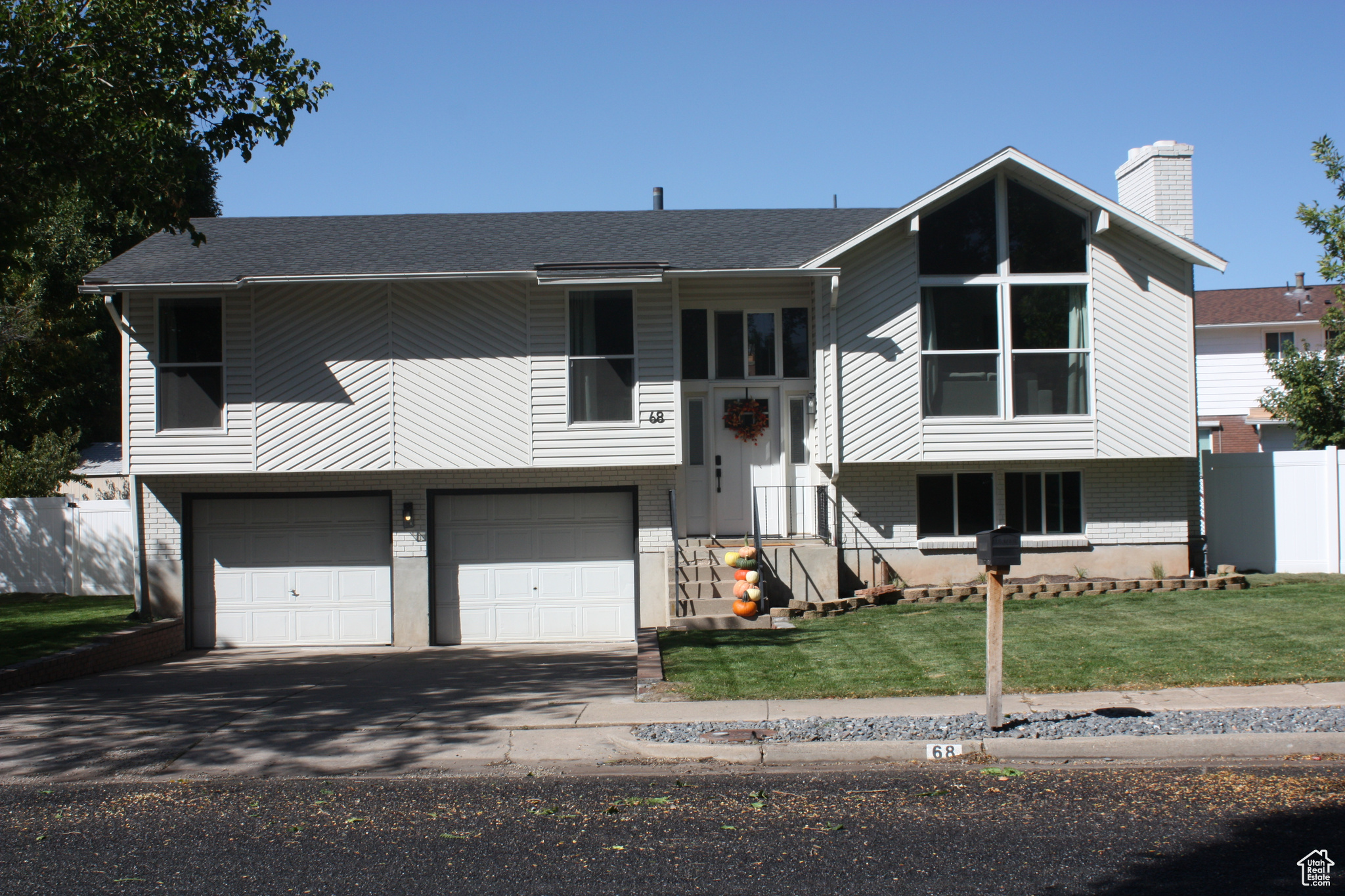 Completely remodeled inside and out, this home offers modern updates throughout. The brand-new kitchen and bathrooms feature elegant quartz countertops, while the spacious, fenced yard comes with a large storage shed. Enjoy new carpeting, luxury vinyl plank (LVP) flooring, updated windows, new paint, hardware, light fixtures, central air conditioning, and landscaping.   Located in the heart of downtown Kaysville, this home is ideally situated near schools, shopping, and transportation options.