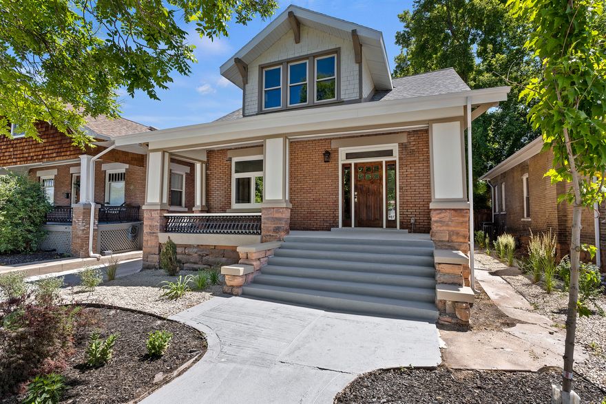 Stunning, no-expense-spared renovation that masterfully blends early 1900s character with modern efficiency, comfort, and reliability.  From the moment you step inside, you're transported back in time. Elegant architectural details and period-correct appointments create the feeling of walking through a beautifully preserved piece of history, like stepping onto a classic film set.  But the true brilliance of this home lies beneath the surface.  Every major system has been meticulously updated and all fully permitted with the city, including plumbing, electrical, HVAC, roof, windows, kitchen, bathrooms, appliances, flooring, paint, and landscaping. This is historic charm without historic headaches. Simply move in and enjoy years of comfort and peace of mind.  Perfectly positioned in the heart of the coveted 9th & 9th neighborhood, just yards from Liberty Park, this location delivers the ultimate urban lifestyle. With a Walk Score of 83 (most errands accomplished on foot) and an exceptional Bike Score of 99  (a true "Biker's Paradise"), daily life here is both vibrant and convenient.  While being in one of the city's most desirable, walkable areas is an incredible advantage, thoughtful upgrades ensure tranquility when you want it. All windows are new double-pane, and the primary suite features specialized acoustic glass designed to minimize city noise, allowing you to enjoy the energy of the neighborhood without sacrificing quiet comfort.  Alley access means you never need to navigate 700 East for entry or exit, and rare off-street parking for up to five vehicles provides flexibility that's nearly impossible to find in this area.  Complete with a private backyard oasis, this home offers the perfect balance of historic elegance, modern reliability, and unbeatable location.  This is not just a renovation - it's a re-imagining of what city living can be.