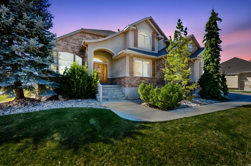 BEST VALUE IN WEST KAYSVILLE! This impeccably maintained home showcasing designer finishes and thoughtful updates throughout. The gourmet kitchen features double wall ovens, a gas cooktop, stainless appliances, granite island, and abundant cabinetry. Beautifully landscaped grounds offer mature trees and lush detail. Light-filled basement with 9' ceilings, FULL BASEMENT KITCHEN WITH WALKOUT-READY FRAMING IN PLACE, spacious family room, two bedrooms, and an elegant bath with oversized shower and dual vanities. Dual 40-gallon water heaters, plantation shutters, and a finished 3-car garage. Located in an excellent neighborhood within the top-rated Davis School District, this home offers easy access to schools, shopping, and recreation.