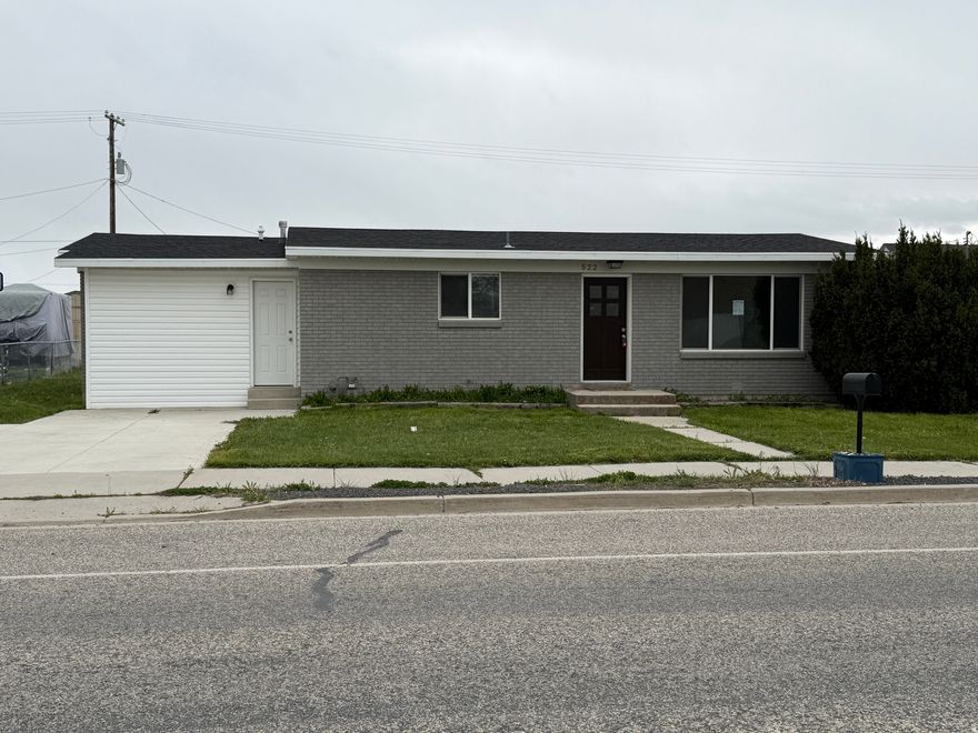 Welcome to this beautifully updated single-family home in the heart of Garland, Utah! Originally built in 1961, this charming residence has been thoughtfully refreshed with brand-new flooring and a modern kitchen featuring stainless steel appliances. Set on a quarter-acre lot, the expansive backyard offers endless possibilities while sweeping farmland views provide a serene rural backdrop you'll enjoy every day. Move-in ready and full of character!