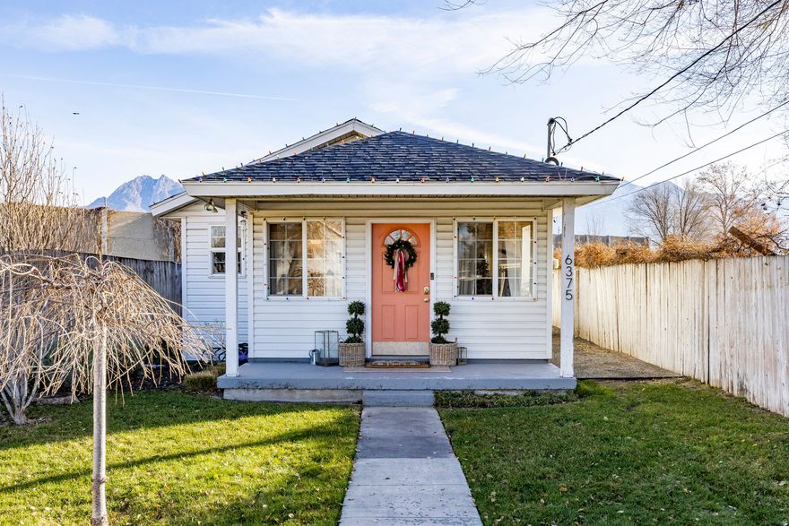 This adorable Murray bungalow offers excellent curb appeal and an incredibly efficient layout. Inside, the layout is bright and open. The living room features hardwood floors and large windows with pull down blinds that fill the space with natural light. The living room flows seamlessly into the updated kitchen with quartz countertops, new cabinet doors, stainless steel appliances, and modern light fixtures. Down the hall are two bedrooms and a beautifully updated bathroom. In the backyard, garden fencing has been thoughtfully replaced with plantings that will mature into a living fence, complemented by raised beds, a drip irrigation system, space prepped for a patio, and posts ready for string lights! The roof was recently replaced alongside the updated HVAC system. All of this comes in a prime Murray location just 4 minutes from Fashion Place Mall and Sam's Club, 8 minutes to Costco, Intermountain Medical Center, and Murray City Park, 10 minutes to the mouth of Big Cottonwood Canyon. A home with this fantastic location is almost unheard of at this price point come see it today!