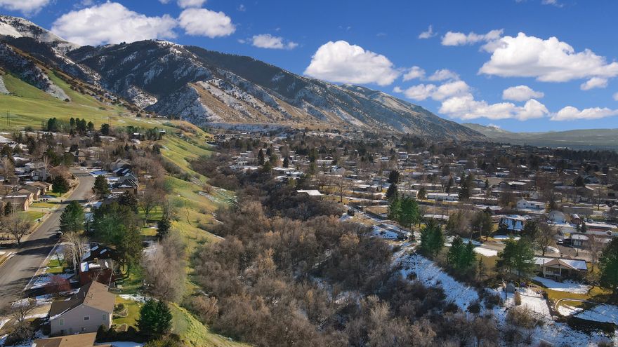 Dream homesite on the desirable east side of Providence. This private hillside lot is tucked away on a secluded private drive, offering stunning views and a peaceful setting alongside Spring Creek. Truly a one-of-a-kind location with natural beauty and privacy. Utilities are conveniently nearby. A rare 2.24-acre view lot-perfect for creating your ideal retreat. Buyer and Buyers agent to verify. Contact agent for more details.