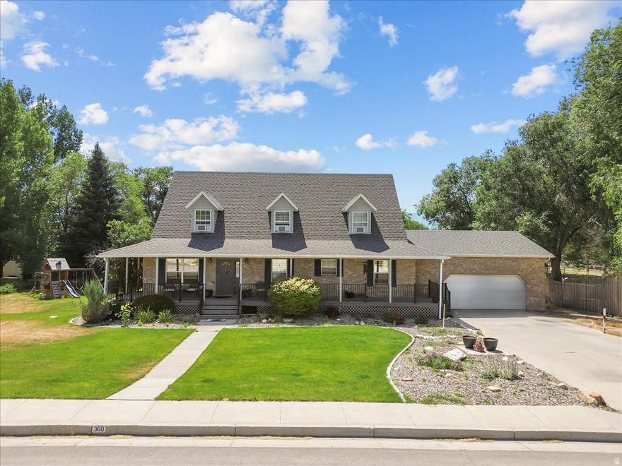 Charming farmhouse-style home featuring a spacious wrap-around porch and an inviting farmhouse sink that sets the tone for warmth and comfort. Inside, you'll find large bedrooms, updated bathrooms, a high-efficiency furnace, and central air for year-round comfort. The finished basement adds valuable living space with a fully functional ADU, family room, and a den/craft room-ideal for extended family, guests, or rental potential. Step outside to enjoy the generous deck, perfect for relaxing evenings or entertaining friends and family. The ADU includes a bedroom, bathroom, spacious family room, and dedicated laundry area, plus two additional versatile rooms without closets-ideal for office, hobby, or storage use.  Square footage figures are provided as a courtesy estimate only and were obtained from Sanpete County Records. Buyer is advised to obtain an independent measurement.