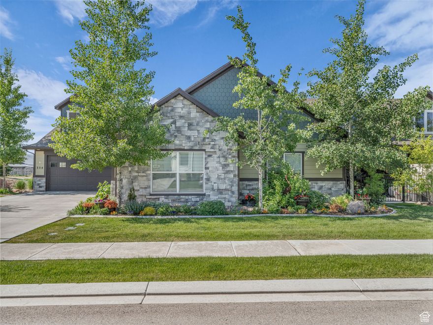 Welcome to the Residences at the Old Mill-the only 55+ community in Summit County, nestled in the heart of Kamas City and surrounded by sweeping mountain views. This immaculate home is a rare find, featuring designer finishes throughout, soaring vaulted ceilings, granite countertops, and a peaceful private patio perfect for morning coffee or evening sunsets. Enjoy a spacious main-floor master suite with a generous walk-in closet, a second bedroom and full bath on the main level, plus a private upstairs ensuite-ideal for visitors or your own quiet escape. Located at the gateway to the Uinta Mountains, this vibrant community is a dream for outdoor enthusiasts. From hiking, fishing, and camping to snowshoeing, cross-country skiing, and wildlife watching, adventure is just minutes from your front door. With all the charm of small-town living and the natural playground of the Uintas at your fingertips, why live anywhere else? This is more than a home-it's a lifestyle in one of Summit County's most sought-after settings.