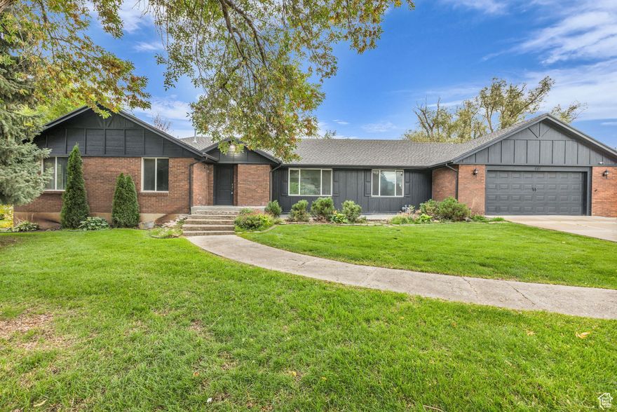 Huge Price Drop! Fully remodeled home on a quiet street with stunning mountain views. Nearly everything is new, including the kitchen, flooring, paint, lighting, tile work, carpet, vanities, baseboards, trim, fixtures, appliances, and cabinetry. Mature trees and garden areas enhance the large nearly half-acre lot. The basement includes a spacious mother-in-law apartment with a separate entrance, currently rented month to month at $1,200 but going rate is $1,700 monthly.