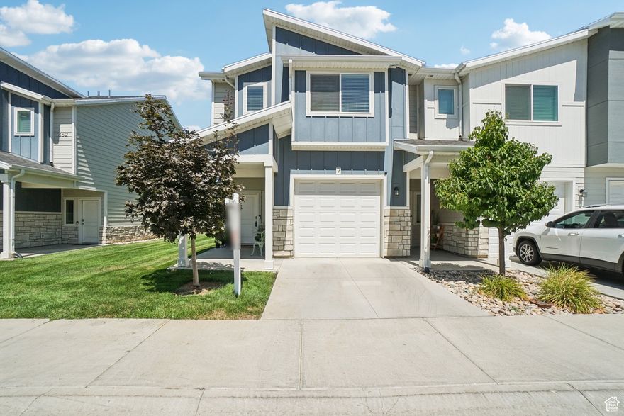 Step into this stylish end-unit townhouse in North Ogden and instantly feel at home. With quartz countertops, sleek dark cabinetry, stainless steel appliances, and trendy designer finishes, this home offers the perfect blend of style and function. The open-concept main floor is ideal for entertaining or relaxing, with direct access to your attached garage. Upstairs, you'll find a spacious primary suite with a dreamy walk-in closet, two additional bedrooms, and a conveniently located laundry area. Enjoy access to the community clubhouse, complete with a gym and pickleball courts, all while being surrounded by stunning mountain views. Plus, this property is investor-friendly, making it a fantastic opportunity for both homeowners and savvy buyers alike.