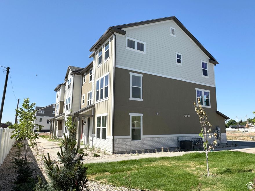Corner-lot townhome with open layout, two living areas, quartz kitchen, and spacious owner's suite with walk-in closet. Includes an unfinished flex room for a 4th bedroom or office. Steps from a park, and close to Hill AFB, I-15, shopping, and Lagoon. Qualifies for the $20K Utah Housing Grant + Special Incentives with preferred lender! Schedule your showing today!