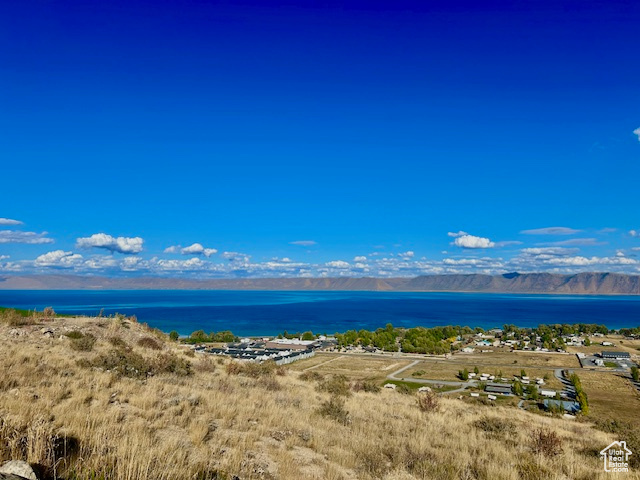Beautiful prime lot with breathtaking mountain and lake views! This property offers the perfect blend of tranquility and convenience, just 5 minutes from town and the marina. Ideal for building your dream home or vacation retreat.
