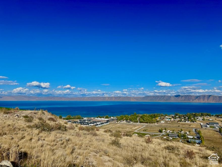 Beautiful prime lot with breathtaking mountain and lake views! This property offers the perfect blend of tranquility and convenience, just 5 minutes from town and the marina. Ideal for building your dream home or vacation retreat.
