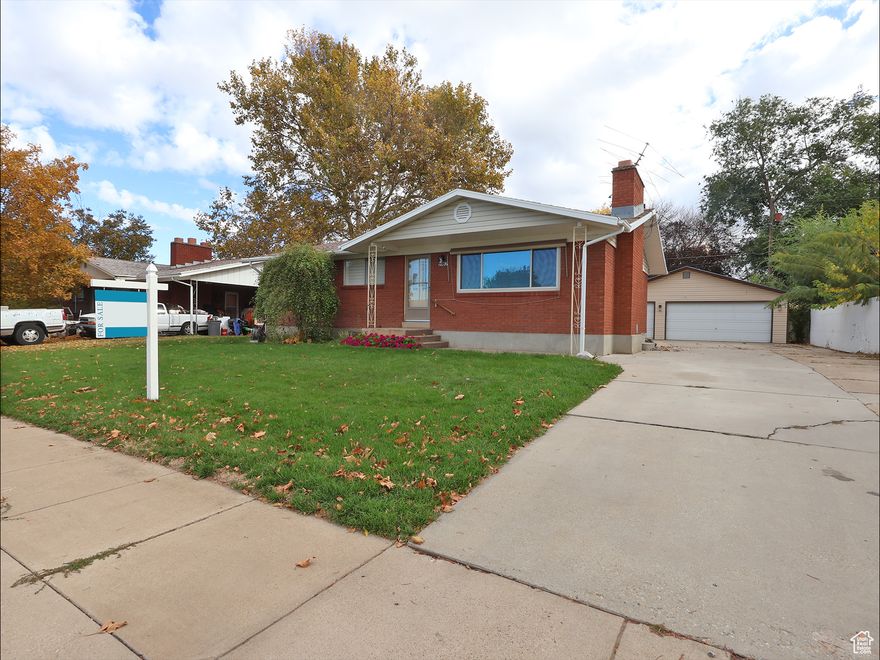 Welcome home to this well maintained Rambler Ranch-Style Home. Featuring 4 bedrooms and 2 bathrooms. You'll love the updates throughout - including new carpet, fresh paint, updated appliances , high efficient furnace & AC, updated windows, with plantation shutters.  All this make this home move-in ready.  A brand-new roof is being installed within the next couple of weeks for added peace of mind. Property is fully landscaped with automatic sprinklers, offering a low-maintenance yard. The oversized detached 3-car garage provides plenty of space for vehicles, storage, or a workshop. Ideally located close to schools, shopping, and amenities, with quick access to I-15 for an easy commute. As an added bonus, seller will include carpet for the family room and fourth bedroom with a full-price offer.  Come Check This Out!!