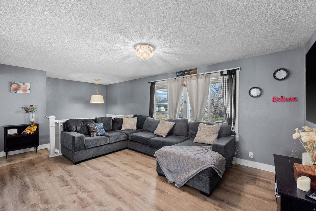 Photo of 5353 W PEGGY LN, West Valley City, UT 84120 (MLS # 2145337)