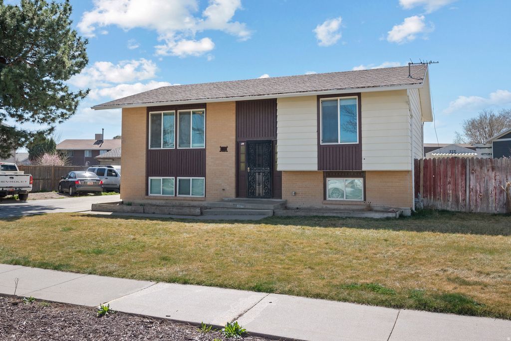 Photo of 5353 W PEGGY LN, West Valley City, UT 84120 (MLS # 2145337)