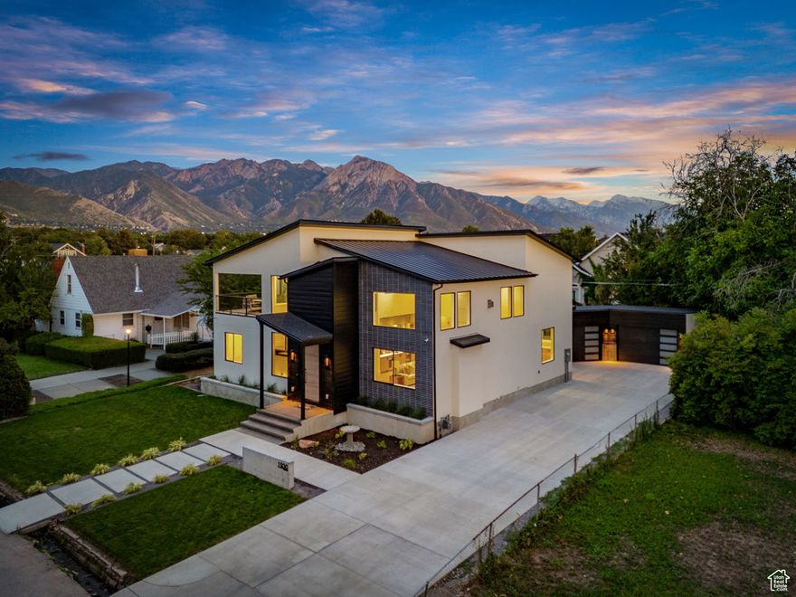 Listed as House #1 in the 2025 Parade of Homes magazine, this custom residence by 369 Homes sits on the prestigious Atkin Avenue in Millcreek-just blocks from the Salt Lake Country Club and minutes to downtown and Sugarhouse Park. Expansive windows and sliding doors flood the home with natural light and frame sweeping views of the Olympus mountain range. The open floor plan flows seamlessly between living, dining, and kitchen areas, ideal for both everyday living and entertaining. Luxury details include Mont Blanc quartzite with integrated sinks, aprons, and waterfall edges, solid-core custom white oak doors, wide-plank flooring, designer lighting, and custom cabinetry throughout. The spacious lower level offers flexibility for a home theater, recreation room, or golf simulator. Outdoor patios and landscaped grounds extend the living space, while the garage provides ample storage and EV-ready convenience. This home combines prime location, modern design, and exceptional craftsmanship.