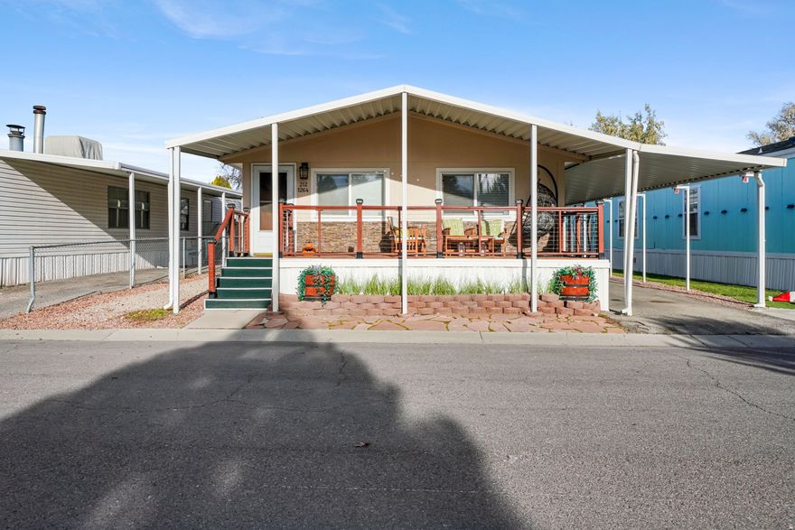Move-in ready updated mobile home with tons of upgrades! This home features a new water heater (6 months old), new kitchen backsplash, and an updated sink. Tile and interior paint were redone just 2 years ago. The roof was replaced about 5 years ago, and the central air is only 3 years old-great peace of mind for the next owner! You'll also enjoy the cozy gas fireplace and updated tile + vinyl wood flooring throughout. Washer and dryer currently inside will be taken, but another set will be left for the buyer. Located near stores, shopping, and quick access to the highway, making errands and commuting super convenient. Clean, updated, and ready for its new owner. Square footage figures are provided as a courtesy estimate only. Buyer is advised to obtain an independent measurement.