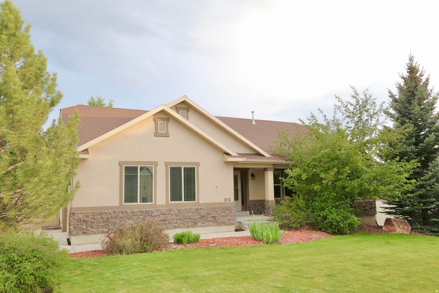 Wonderful home & location on a large corner lot with a side-loading garage and a very private, beautifully landscaped backyard with no backyard neighbors. Large covered deck perfect for outdoor entertaining and enjoyment. Top quality features including a gourmet kitchen with raised panel alder wood cabinetry, spacious/luxurious main floor master suite, vaulted ceilings, high efficiency furnace, home prewired for high-speed internet/TV & much more! The attached insulated workshop has a 220-volt 100-amp subpanel with a workbench, shelves & lighting. Close to elementary, middle & high school. Wonderful home at a great price!