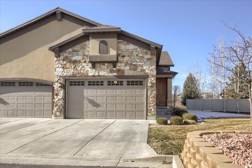 This end-row townhome in South Ogden offers privacy and low-maintenance living. With wide open green space behind the private patio, the setting feels open and peaceful, creating a rare backdrop for townhome living.  The main level features a bright great room, granite countertops, and a functional kitchen that flows into the living and dining areas. The primary bedroom includes a walk-in closet and private bath. Did we mention all of this is on the main level?  The fully finished basement adds flexibility with an additional bedroom, bathroom, and family room. All utilities are in place for a wet bar, second kitchen, or additional laundry, making the space ideal for guests, multi-generational living, or future customization.  Additional highlights include a 2-car garage, central air, and an HOA that covers exterior maintenance and snow removal. Conveniently located near shopping, dining, and schools.  Square footage figures are provided as a courtesy estimate only and were obtained from county records.  Buyer is advised to obtain an independent measurement.