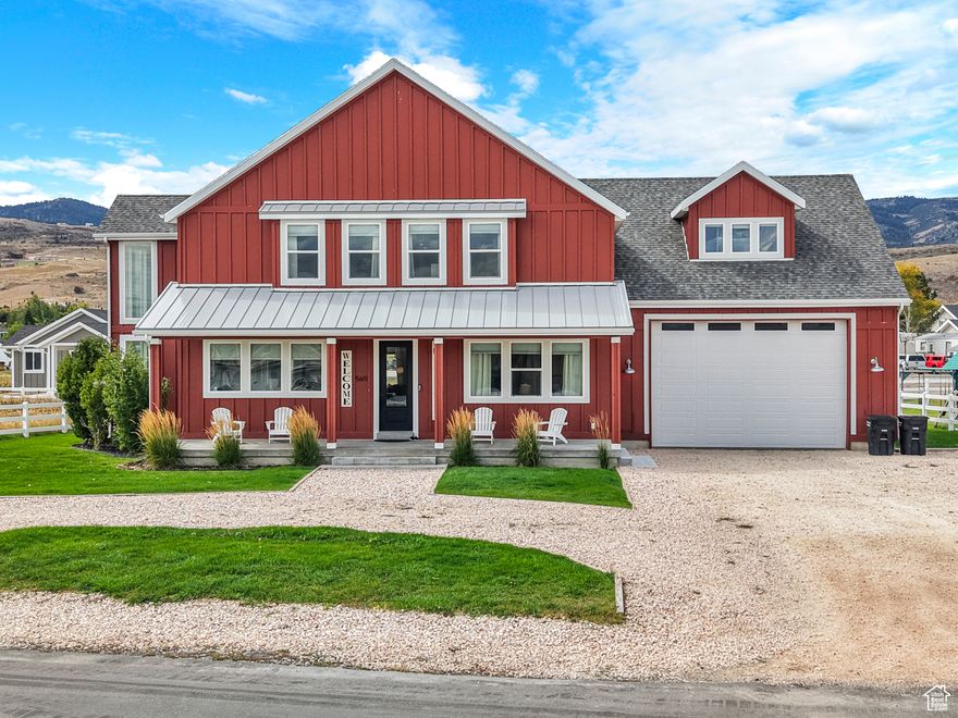 SHORT-TERM RENTAL opportunity in the heart of Garden City! This spacious 4,052 sq ft home offers 6 bedrooms, 5 bathrooms, and sleeps up to 37 guests, making it ideal for large family gatherings, reunions, or group getaways. Oversized bedrooms provide plenty of comfort, while the expansive great room seamlessly connects the kitchen, dining, and living areas with an open floor plan designed for entertaining. Loaded with upgrades, the home features quartz countertops, tankless water heater, smart thermostat, James Hardie siding, ceiling fans, auto sprinkler system, and a propane gas stove with thermostat control. Drapes and blinds are installed on all windows (except the floating stairway), and both washer/dryer and garage refrigerator/freezer are included. The 4-car garage offers a 17-foot-high door to accommodate motorhomes or ski-boat towers. The property is fully set up for guests with a 10-person Bullfrog hot tub, custom swing set, playground, basketball 2-station game, mini-pool table, foosball, standalone arcade game, and even 15 bicycles included. Guests can enjoy the outdoors with a spacious yard, circular driveway, and parking for at least 6 cars in addition to the garage. Located within walking distance to Garden City's Heritage Park, restaurants, and the Bear Lake Boardwalk, and just 5 minutes from Bear Lake Marina, this turn-key investment offers comfort, recreation, and strong income potential in one of Bear Lake's most sought-after locations.