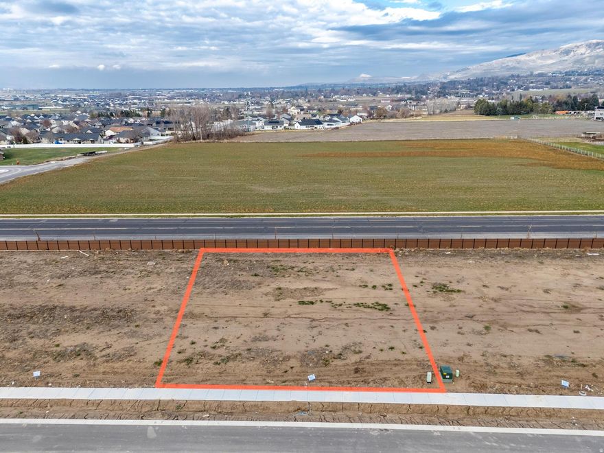 LOT # 7 Smiling H Subdivision is an inviting community located in the charming North Logan, Utah. This beautifully designed neighborhood offers a variety of amenities and features that cater to any lifestyle. Residents can enjoy the nearby recreational activities, include pickle ball courts, a splash pad for fun on warm days, and even an ice rink for winter sports enthusiasts. A public library and a police department nearby enhance the community's convenience and security. Families will appreciate the close proximity to schools, making it easy for children to access quality education. Additionally, every building lot is equipped with secondary water connections which is a big saver for the overall water bill. The availability of high-speed fiber internet provides residents with excellent connectivity for work and leisure. The fiber internet bill is part of the low monthly HOA fee of $65. Overall, Smiling H Subdivision offers a harmonious blend of nearby recreational opportunities and essential services, making it an ideal place to call home.