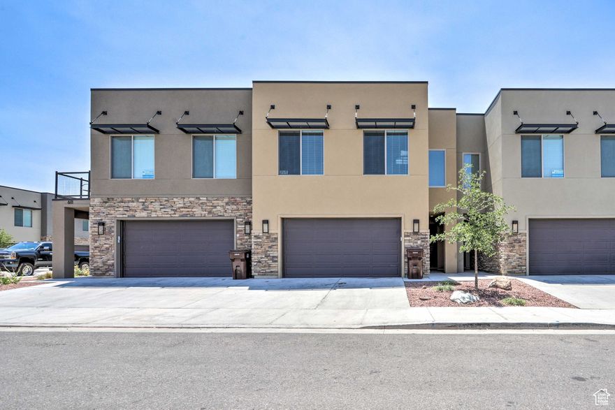 $29,000 PRICE REDUCTION! Turnkey Nightly Rental in the Desirable Entrada community! Own a fully furnished, 4-bedroom, 3-bath townhouse in one of Moab's most sought-after nightly rental communities. This spacious, open-concept unit features 9-foot ceilings, a smart layout for entertaining, and is just steps from the community pool. Perfect as a personal getaway or income-generating rental, this home is turnkey and rental-approved. Located just minutes from downtown Moab's restaurants, shops, and entertainment, it's the ideal base for adventure and a smart investment.