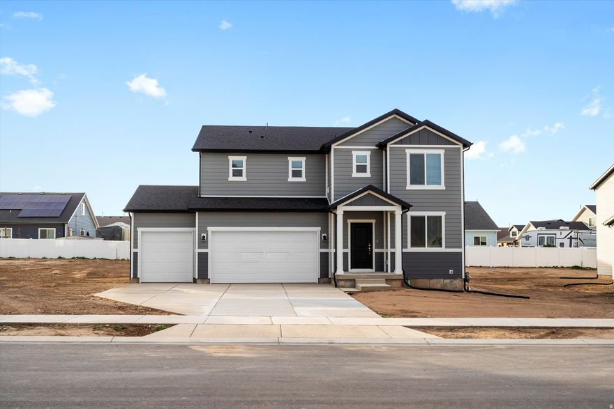 Brand NEW energy-efficient home ready November 2025!  Feel right at home with five bedrooms and a warm, open kitchen-living space made for gathering and quiet moments. Escape to the peaceful upstairs primary suite for a little extra comfort. Unfinished basement included. Move in ready with a washer, dryer, fridge and blinds throughout!  Total home approx. sq. ft. 4,067. Located in Santaquin, our move-in ready homes include a washer, dryer, fridge, and whole home blinds. Enjoy a 3 car garage on all homes with walking distance to the elementary school and nearby parks and grocery store, and easy access to the I-15 freeway. All floorplans come standard with spray foam insulation & an unfinished basement.