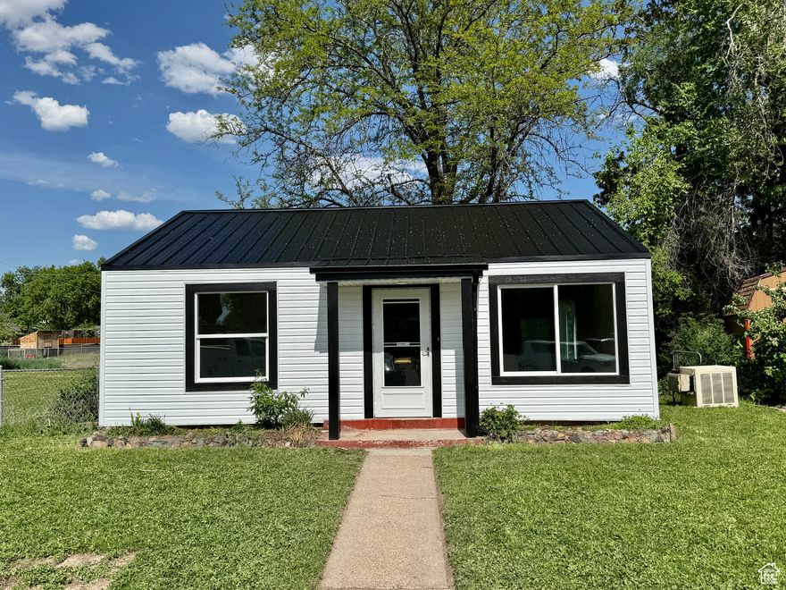 Price REDUCED! This home has been completely remodeled. New insulation, electrical, plumbing, windows, drywall, cabinets, counter tops, tub surround, lighting, paint, finish trim, carpet, LVP flooring, A/C system, gas range, dish washer, microwave, siding. Fully fenced yard ready for pets.