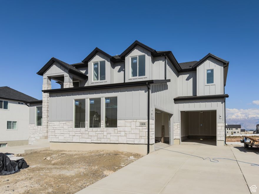Lot 176 Brixton Park The Oquirrh. Home is nearing completion and could be completed in as little as 30 days! Standard features include a finished basement with ADU, walkout basement, large kitchen with gourmet appliance package, mudroom, designer laminate wood flooring, massive vaulted primary suite with great mountain views and more! Buyer to verify all info