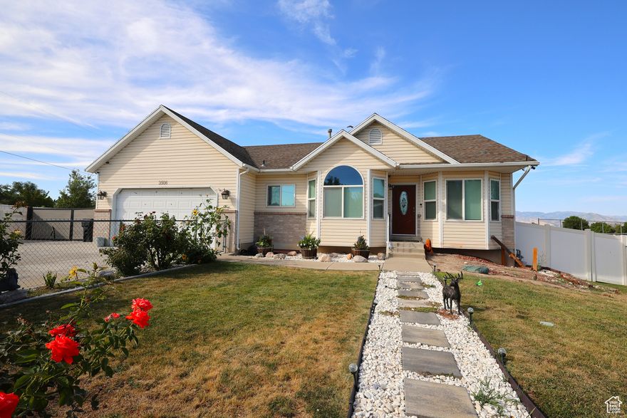 This home truly has it all! Sitting on a private 0.32-acre lot, the fully fenced yard features a drive-through gate, a gravel parking area perfect for vehicles and toys, and a covered patio to relax and enjoy. There's also a large storage shed for extra storage.  Inside, you'll find an updated kitchen with granite countertops and beautiful tile work throughout. The owner's suite includes its own private bathroom, and the home is enhanced with modern, updated light fixtures. Come see this home for yourself!