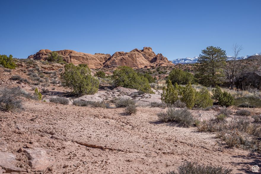 HIGH DESERT BEAUTY - This stunning acreage parcel is well situated to ensure that sunrises over the La Sal Mountains to sunsets along the Moab Rim will frame your days in beauty. The views of the slickrock fins are particularly breathtaking. The property has gorgeous topography and red rock character with native vegetation throughout. Conveniently located less than 10 minutes southeast of downtown, this parcel sits on the eastern side of the valley moments away from BLM land with easy access to hiking, biking, 4x4 trails, as well as Moab's Golf Club. Surrounded by lovely homes, there are no restrictive covenants or HOA. Municipal utilities are in the street. A rare site for your Moab haven.