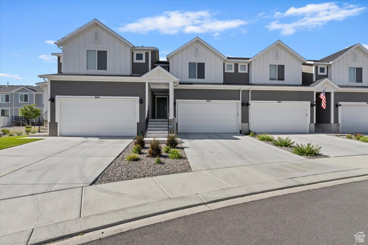 Nestled between Deseret Peak, Utah Motorsports Campus, and downtown SLC, this turn-key mid-unit townhome delivers low-maintenance living with excellent access: 35 minutes to downtown SLC, 30 minutes to the Deseret Peak trailhead, and 15 minutes to Utah Motorsports Campus. The open main level features stone-gray cabinets, quartz countertops, stainless appliances, and laminate floors. Upstairs offers spacious bedrooms with generous closets, plus an unfinished basement for storage or your own customization in the future. Don't miss out on this perfectly located townhome for all of your adventurous needs. Square footage figures are provided as a courtesy estimate only and were obtained from county records. Buyer is advised to obtain an independent measurement.