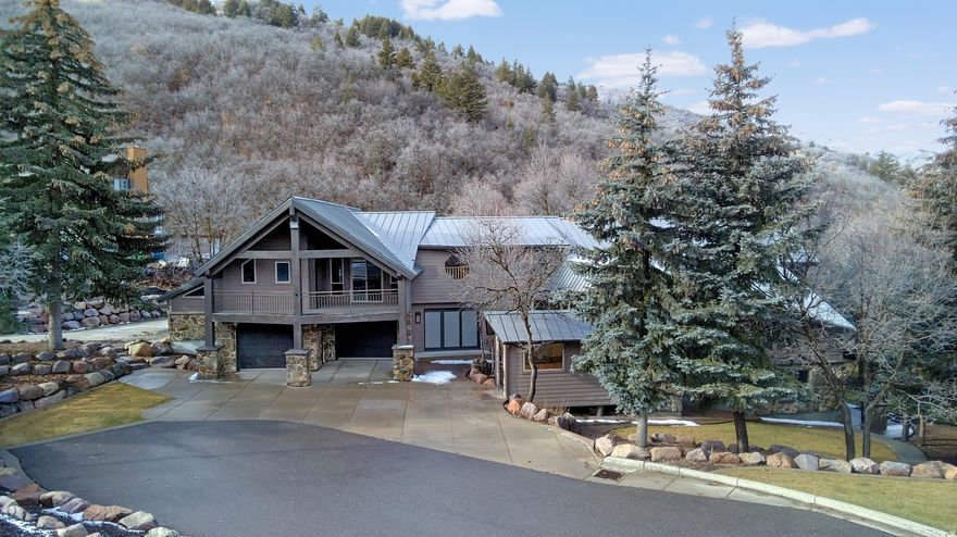 This one-of-a-kind mountain retreat sits nestled below Nordic Valley and is minutes away from Powder Mountain, Snowbasin, Wolf Creek and Pineview Reservoir. Enjoy the beautiful scenery and seclusion from one of the covered decks. Inside you'll find plenty of space filled with cozy and beautifully crafted wood details.  Gourmet kitchen with custom cabinets, granite countertops, tile backsplash and stainless steel appliances. The home also features newer flooring and paint. Hidden walk in safe, 2 floor master bedroom and bath are just a few of the features you need to see in person. Newer roof, 2 newer furnaces, newer A/C unit, 2 newer water heaters, and almost all electrical is new or has been updated in the last few years as well. Garage provides plenty of room for storage and toys. Seasonal stream in the back of the property.