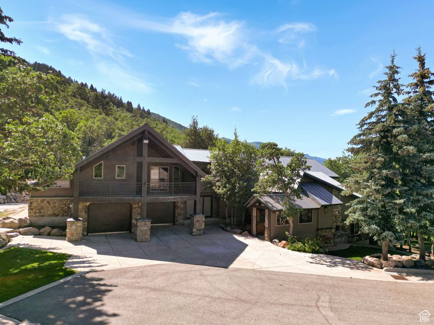 This one-of-a-kind mountain retreat sits nestled below Nordic Valley and is minutes away from Powder Mountain, Snowbasin, Wolf Creek and Pineview Reservoir. Enjoy the beautiful scenery and seclusion from one of the covered decks. Inside you'll find plenty of space filled with cozy and beautifully crafted wood details.  Gourmet kitchen with custom cabinets, granite countertops, tile backsplash and stainless steel appliances. The home also features newer flooring and paint. Hidden walk in safe, 2 floor master bedroom and bath are just a few of the features you need to see in person. Newer roof, 2 newer furnaces, newer A/C unit, 2 newer water heaters, and almost all electrical is new or has been updated in the last few years as well. Garage provides plenty of room for storage and toys. Seasonal stream in the back of the property.