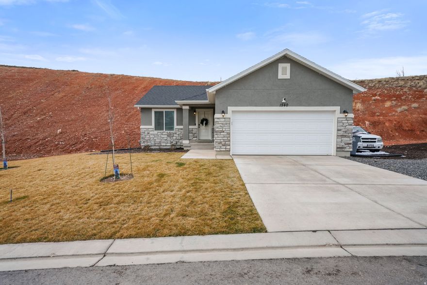 Welcome to the Golden Hour. This warm rambler in Santaquin sits on nearly half an acre, in one of the most peaceful neighborhoods with walking trails and incredible views. It's spotless, cozy, and honestly... one of those homes you fall in love with the second you walk in