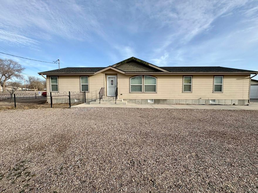 Great location directly across from the rodeo grounds. This well-maintained home features vaulted ceilings and recent updates including newer LVP flooring and fresh paint throughout. The primary bedroom offers a private ensuite bath with a relaxing soaker tub and a separate shower. Comfortable, inviting, and ideally situated for enjoying local events and open space.