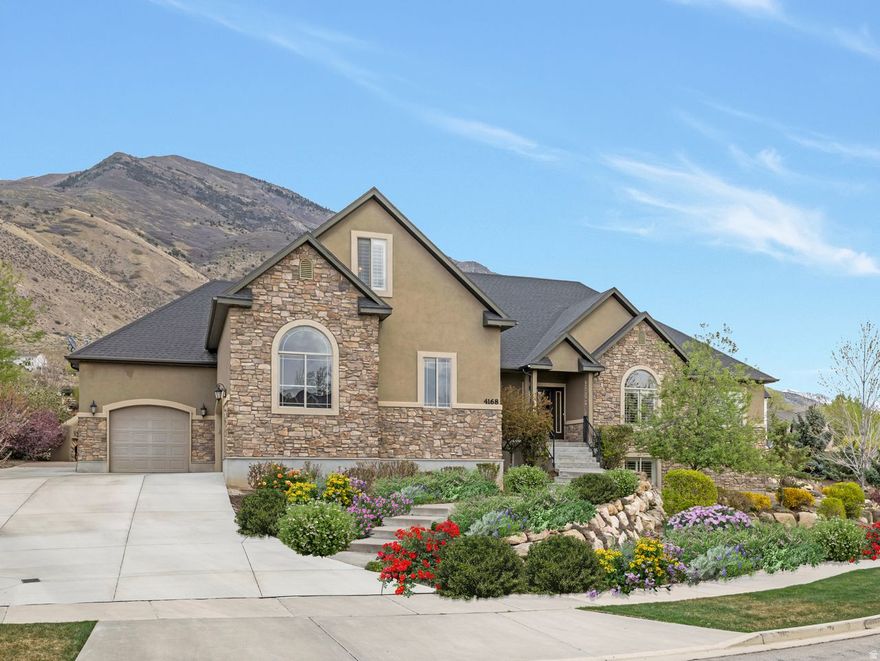 Welcome to this spectacular, one-owner home nestled on a quiet cul-de-sac, offering the perfect blend of comfort, space and breathtaking surroundings. Enjoy a private backyard retreat designed for both relaxation and entertaining, featuring an expansive deck, stone patio, built-in pizza oven and fireplace, planter boxes, fire pit, and even an in-ground trampoline - all set against stunning mountain, valley and lake views. Inside, the home boasts exceptional functionality with spacious living areas on all three levels. The great room impresses with a vaulted ceiling and cozy fireplace, while main-level den provides the perfect space for a home office or study. Both the upper and lower levels include full kitchens equipped with stainless steel appliances, granite countertops pantries and abundant cabinetry - ideal for multi-generational living or entertaining. Additional highlights include an oversized 3-car garage with extensive storage shelves, cabinets and a workbench, as well as a convenient mudroom, laundry room and powder room located just off the garage. Perfectly situated near schools and parks, this home offers a rare combination of privacy, thoughtful design, and unbeatable location. A truly special opportunity you won't want to miss.