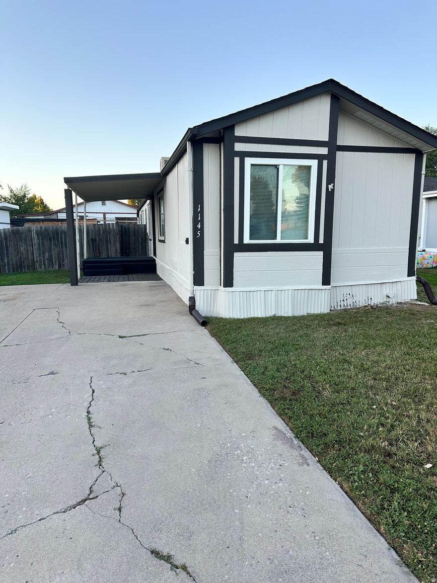 Updated 2-bedroom, 2-bath mobile home on its own lot with no HOA! Features fresh interior and exterior paint, a functional floor plan, and comfortable living spaces. Great opportunity for first-time buyers or those looking to downsize while still owning their own property. Move-in ready and full of potential!   Square footage figures are provided as a courtesy estimate only and were obtained from tax records.  Buyer is advised to obtain an independent measurement.