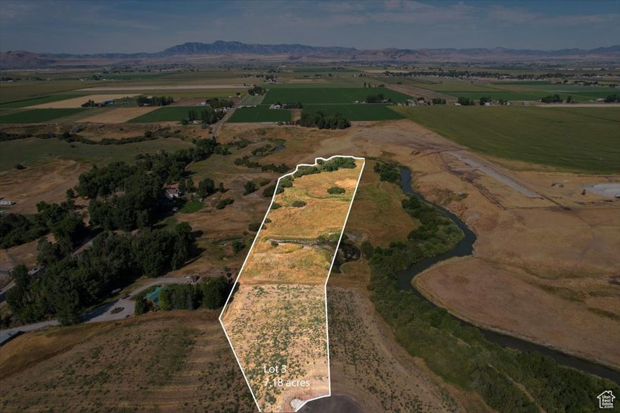 Exceptional 7.1-acre parcel with a spring fed pond, pasture and 400 ft of Cub River frontage. A rare find with this much usable land. Perfect for water, open space and recreation right out your back door. Only 15 minutes from Cherry Peak Ski Resort.