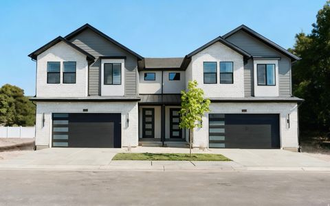 Photo of 6719 S VAUGHN LN #10, Midvale, UT 84047 (MLS # 2117089)