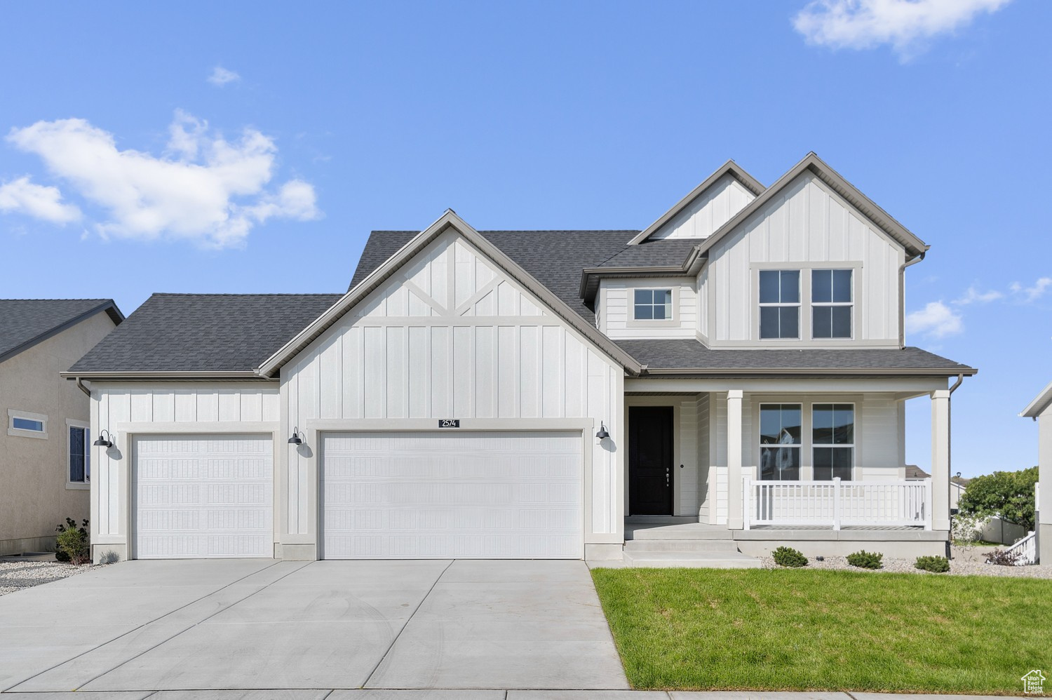 Charming and functional, this 2050 Farmhouse home blends classic style with modern efficiency all in a great community! Interior features include a stylish kitchen with crisp white laminate cabinets, quartz countertops, and stainless steel gas appliances, all complemented by durable laminate hardwood, vinyl tile, and carpet flooring. Enjoy added natural light with a box window in the kitchen nook, plus a spacious 3-car garage with a keypad and exit door for convenience. The home includes 9- foot basement foundation walls, a walk-out basement door, and energy-efficient upgrades, including a tankless water heater. Thoughtful interior touches include can lighting, two-tone paint, wood railing at the stairway, and Craftsman-style base and casing. The owner's bathroom is finished with cultured marble shower surrounds and sleek satin and brushed nickel hardware. Comes fully landscaped that is maintained by the HOA for hassle free living! Come check it out today!