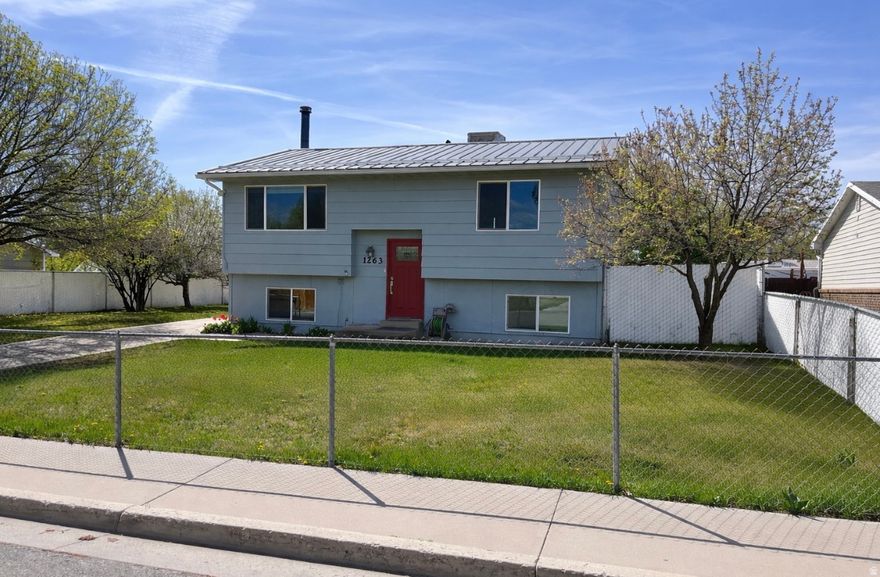 Looking for a place that truly feels like home?  This charming 4-bedroom, 2-bath home offers comfort, warmth, and space to make lasting memories.   1,568 sq ft of inviting living space  Beautiful hardwood floors throughout  Cozy fireplace for relaxing nights  Deck right off the kitchen-perfect for morning coffee  or summer BBQs  Brand-new central A/C to keep you cool  Built in 1978 and full of character, this home blends classic charm with modern comfort in a quiet, welcoming neighborhood.   1263 W 150 S, Vernal, UT  This one won't last long-schedule your showing today!  Message me for details or to book a tour!  Square footage figures are provided as a courtesy estimate only and were obtained from county records.  Buyer is advised to obtain an independent measurement.