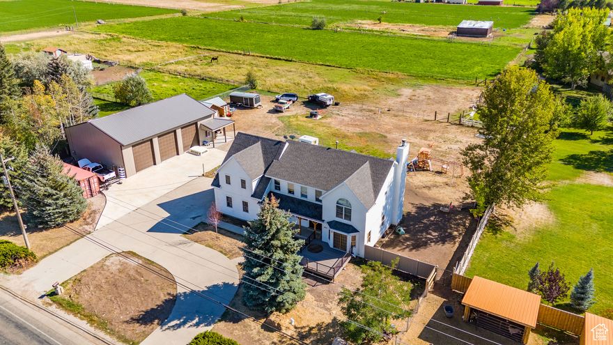 Welcome to your dream property in Heber Utah! Sitting on 1.22 Acres, with water rights and a brand new 2400 SqFt shop. This property is an absolute dream. Within 20 minutes of the home you can find yourself at Jordanelle Reservoir, Deer Creek Reservoir, Wasatch Mountain State Park, Deer Valley East Ski Resort, and Park City Mountain Resort. All of your basic amenities such as restaurants and groceries are within 10 minutes, and Heber Valley Airport is only 8 minutes away.  Included in the sale will be the car lift in the garage, heaven hybrid sauna  and cold plunge (worth over $15,000).   The water rights are unlimited use, covers the backyard in two locations and the pasture.   This is truly an excellent opportunity to come enjoy all of the benefits that living in Heber offers, with plenty of land and storage for anything that you desire.