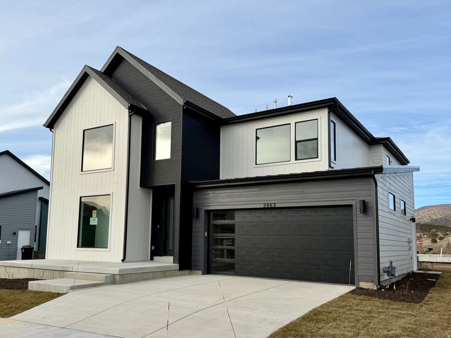Offering 4.99% rate with preferred lender.   The Glenwild floorplan has 4,656 fully finished square feet, 6 bedrooms, 4 bathrooms. This home has amazing features that will make you want to call this place your home. The master suite is close to the entrance with a huge walk-in closet. Enter the two-story great room with unstoppable light that floods from an open floor plan. Upstairs you will enjoy the loft which can be used as a seating area or a play area for kids. The state-of-the-art kitchen includes gourmet kitchen appliances, double ovens, and a gas cook top including over $200,000 in more in upgrades. If you want the perfect balance of outdoor fun and serenity with access to park city and provo in just 20 min, 2 reservoirs, skiing and much more without paying the park city prices, you have found your home. Fully maintenance free living in the Crossings. Come check it out!